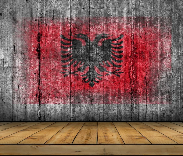 Albania flag painted on background texture gray concrete with wooden floor — Stock Photo, Image