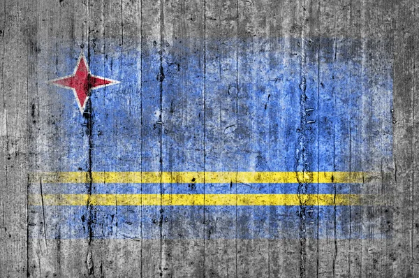 Bandeira de Aruba pintada sobre fundo textura cinza concreto — Fotografia de Stock