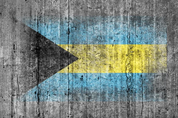 Флаг Багамских островов окрашен на фоне серого бетона — стоковое фото