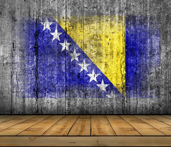 Bandera de Bosnia y Herzegovina pintada sobre textura de fondo hormigón gris con suelo de madera — Foto de Stock