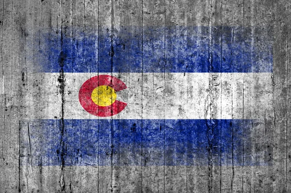 Colorado flaggan målad på bakgrunden konsistens grå betong — Stockfoto