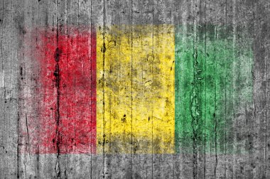 Arka plan doku gri üzerine beton boyalı Gine bayrağı