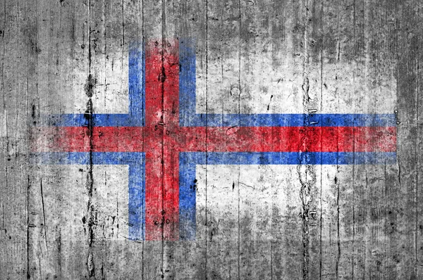 Färöarnas flagg målade på bakgrunden konsistens grå betong — Stockfoto