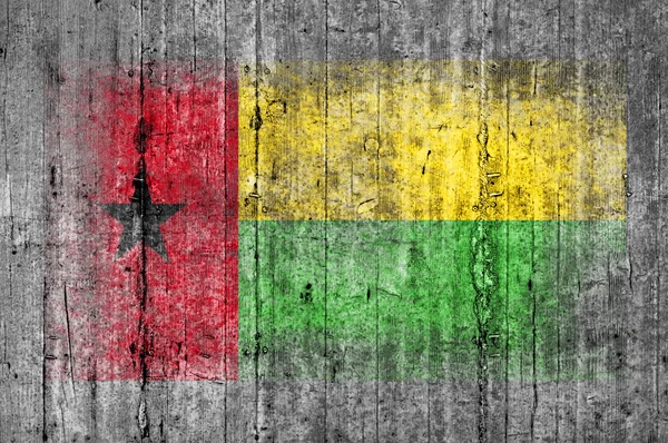 Bandeira da Guiné Bissau pintada sobre fundo textura cinza concreto — Fotografia de Stock