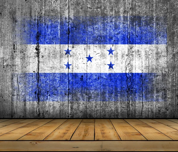 Bandeira de Honduras pintada sobre fundo textura cinza concreto com piso de madeira — Fotografia de Stock