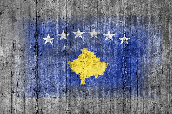 Bandera de Kosovo pintada sobre hormigón gris textura de fondo — Foto de Stock