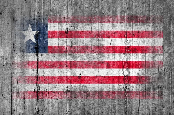 Liberia vlag geschilderd op achtergrond textuur grijs beton — Stockfoto