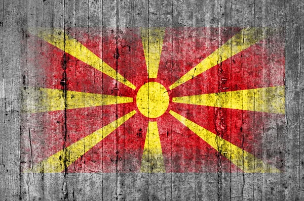 Македонія прапор намальовані на фонові текстури сірого бетону — стокове фото