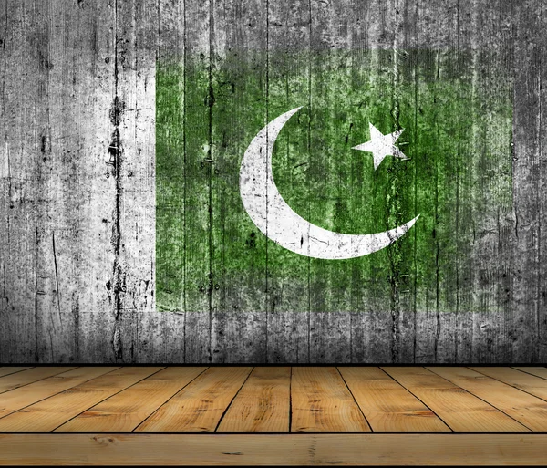 Σημαία του Πακιστάν ζωγραφισμένα στο φόντο υφή γκρι σκυροδέματος με ξύλινο πάτωμα — Φωτογραφία Αρχείου