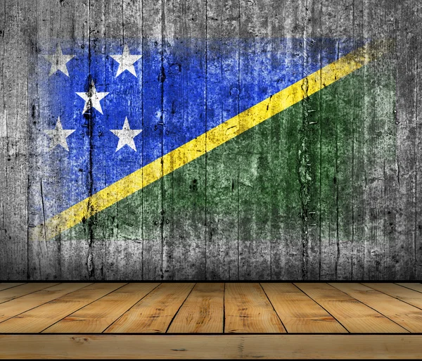 Solomon Islands flag painted on background texture gray concrete with wooden floor. — Stock Photo, Image