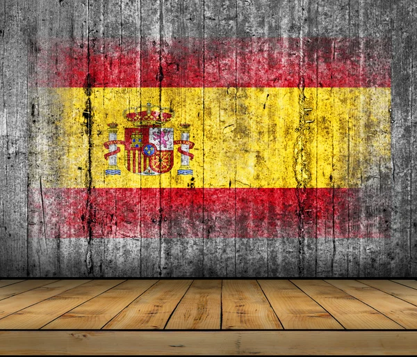 Bandera de España pintada sobre fondo textura gris hormigón con suelo de madera — Foto de Stock