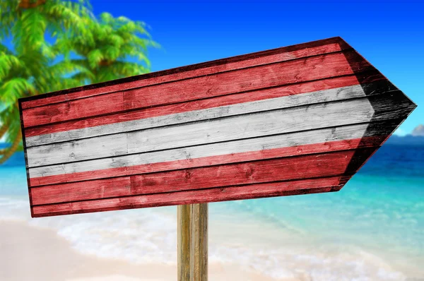 奥地利国旗木签上海滩背景 — 图库照片