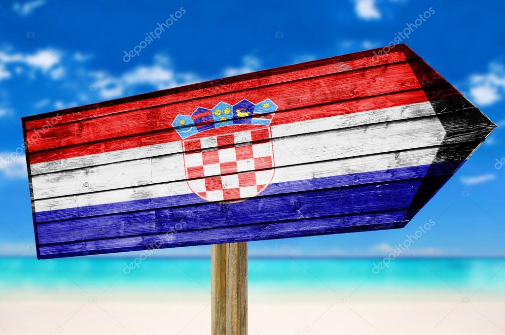 Croatia Flag wooden sign on beach background