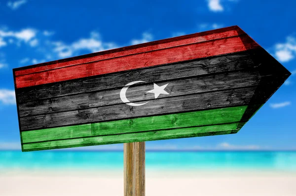 Libye Drapeau panneau en bois sur fond de plage — Photo