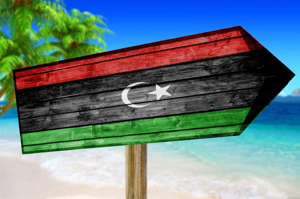 Libye Drapeau panneau en bois sur fond de plage — Photo