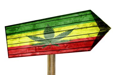 Rasta Flag With Marijuana Leaf wooden sign isolated on white clipart