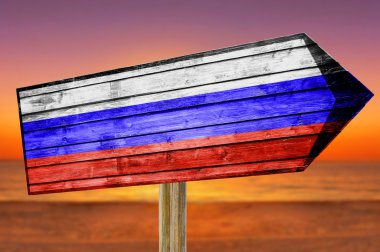 Russia Flag wooden sign on beach clipart