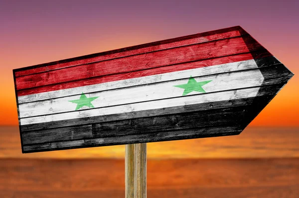 Syria Flag wooden sign on beach background — Stock Photo, Image