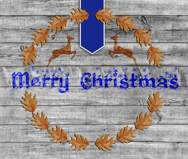 Blue Merry Christmas on wooden background — Stock Photo, Image