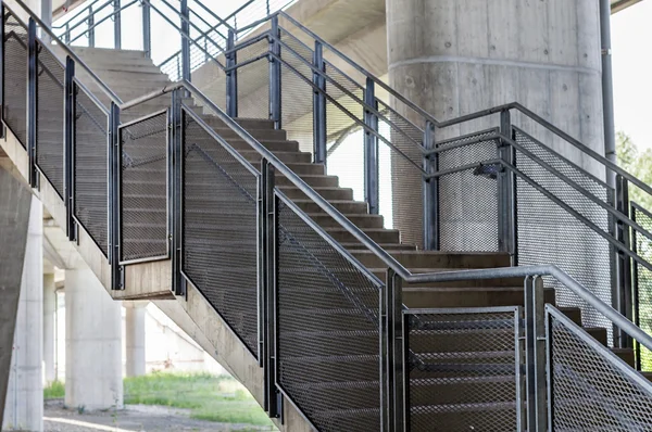 Concrete stairs are metal handrails — Stock Photo, Image