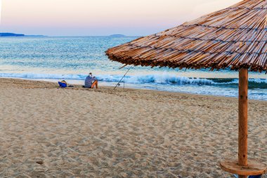 Balıkçı beach izlerken mor günbatımı