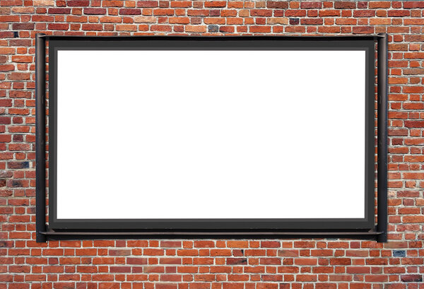 One blank billboard attached to a buildings exterior brick wall