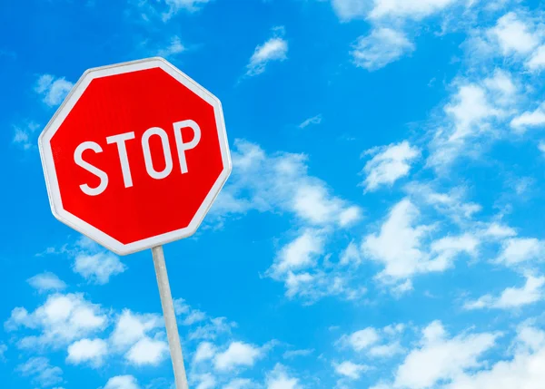 Stop sign against blue sky background — Stock Photo, Image