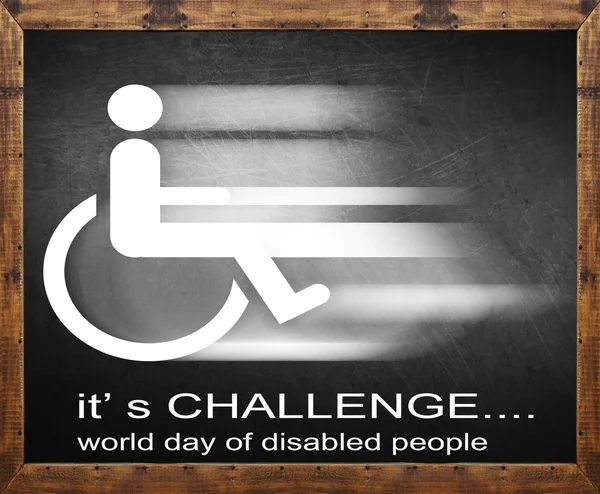 C'est un défi écrit sur le tableau noir, journée mondiale des personnes handicapées — Photo