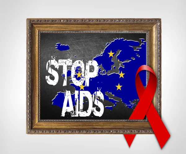 European Unipn STOP AIDS World Aids Day concept with red ribbon and aids awareness