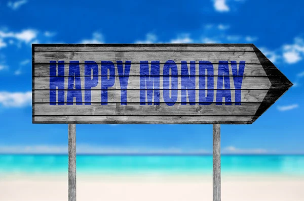 Happy Monday wooden sign with a beach on background — Stock Photo, Image