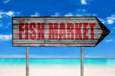 Red Fish Market wooden sign with on a beach background clipart