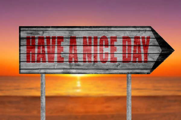 Red Have a Nice Day wooden sign with on a beach background — Stock Photo, Image