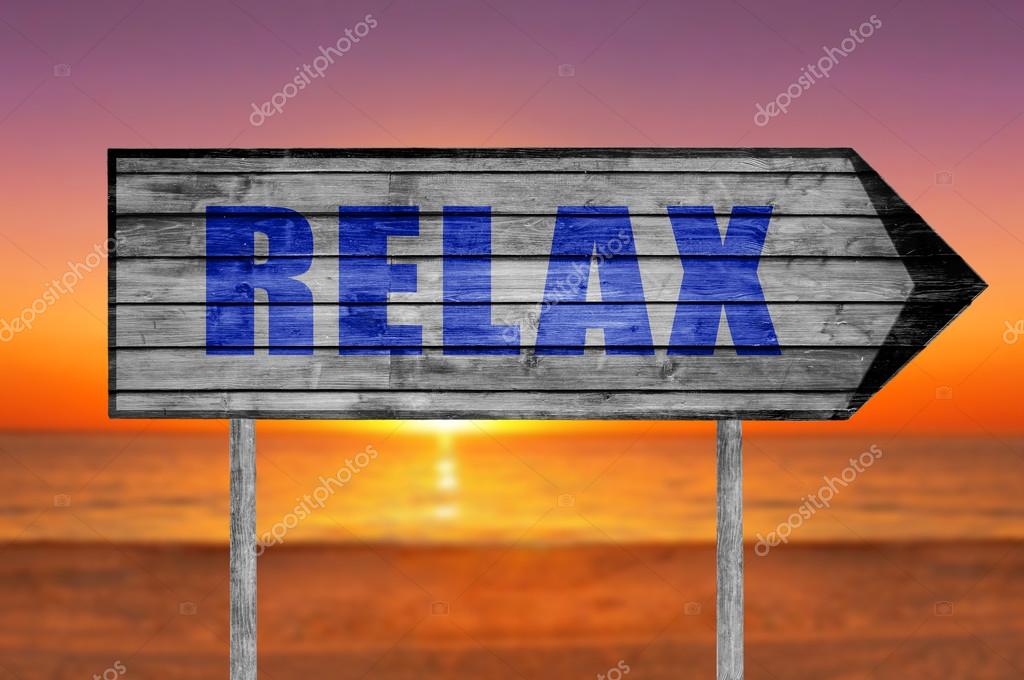 Relax Wooden Sign With A Beach On Background Stock Photo Bennian Relax Wooden Sign With A Beach On Background Stock Photo