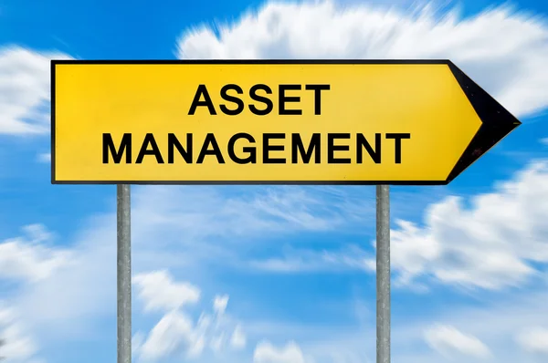 Signo amarillo de gestión de activos de concepto público —  Fotos de Stock