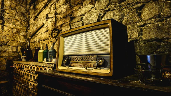 antique radio on wooden furniture