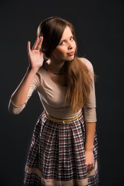 Young charming woman can not hear the sound or speech