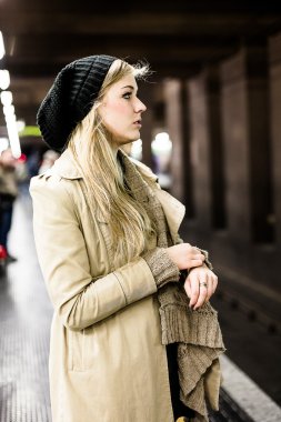 woman  at the subway station