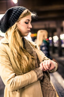 woman  at the subway station