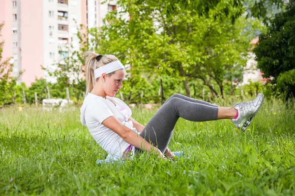 Woman exercising stretching — Stock Photo, Image