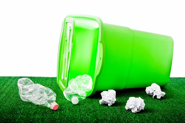 Rubbish bin with plastic bottles and papers — Stock Photo, Image