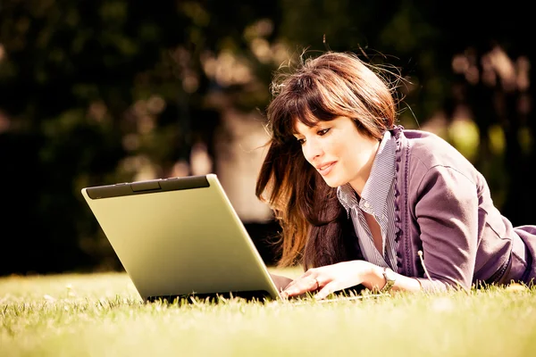 Woman using laptop Royalty Free Stock Photos