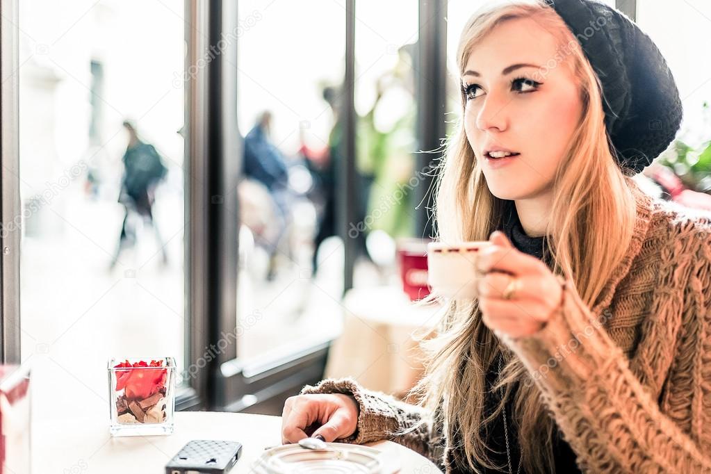 Woman drinking drinking coffee