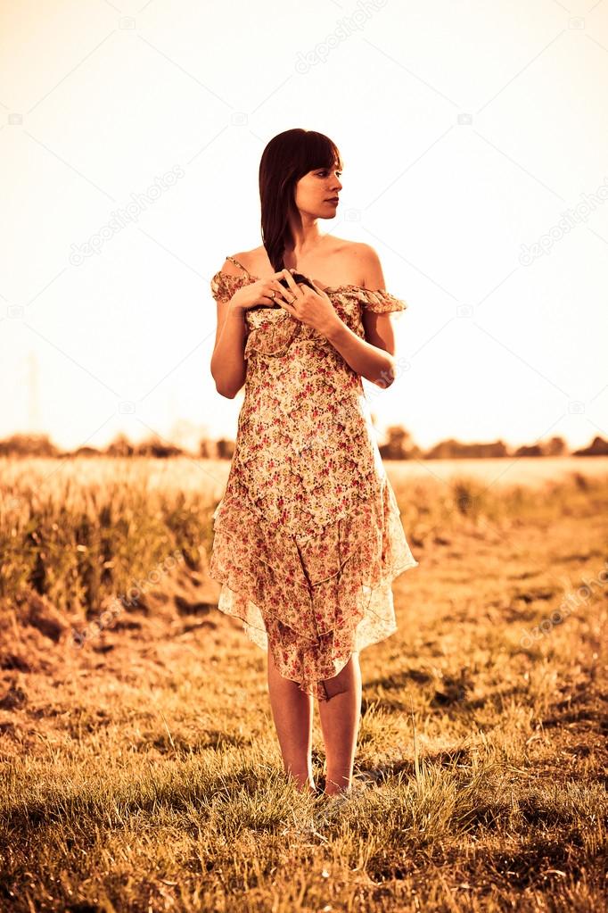 woman relaxing on the  field