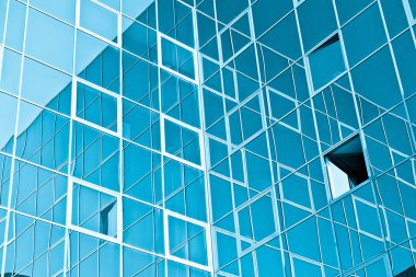 blue glass high rise building skyscraper