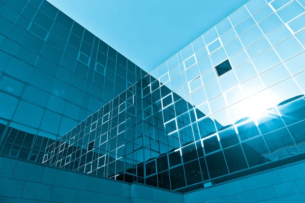 Blue glass high rise building skyscraper — Stockfoto