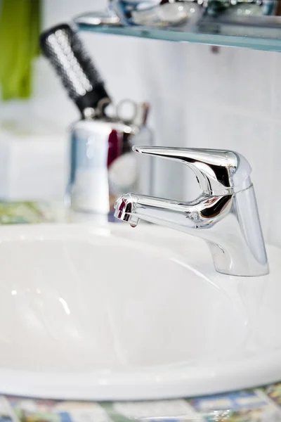 Silver faucet in bathroom — Stock Photo, Image