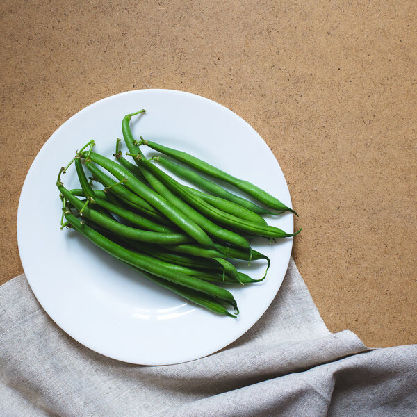 Green beans on a white plate