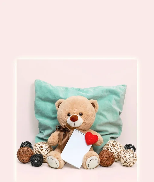 Teddy Bear Holding Notepad Soft Heart Background Blue Pillow Wicker — Stock Photo, Image