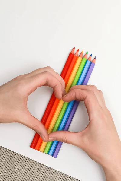 Female Hands Show Shape Heart Background Rainbow Made Colored Pencils — Stock Photo, Image