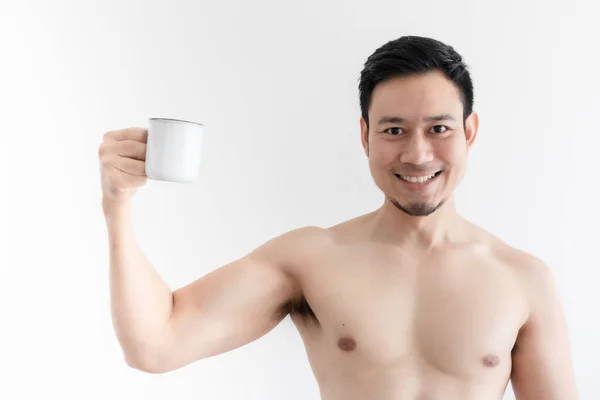 Topless healthy man drinks the healthy coffee on isolated background. — Stock Photo, Image